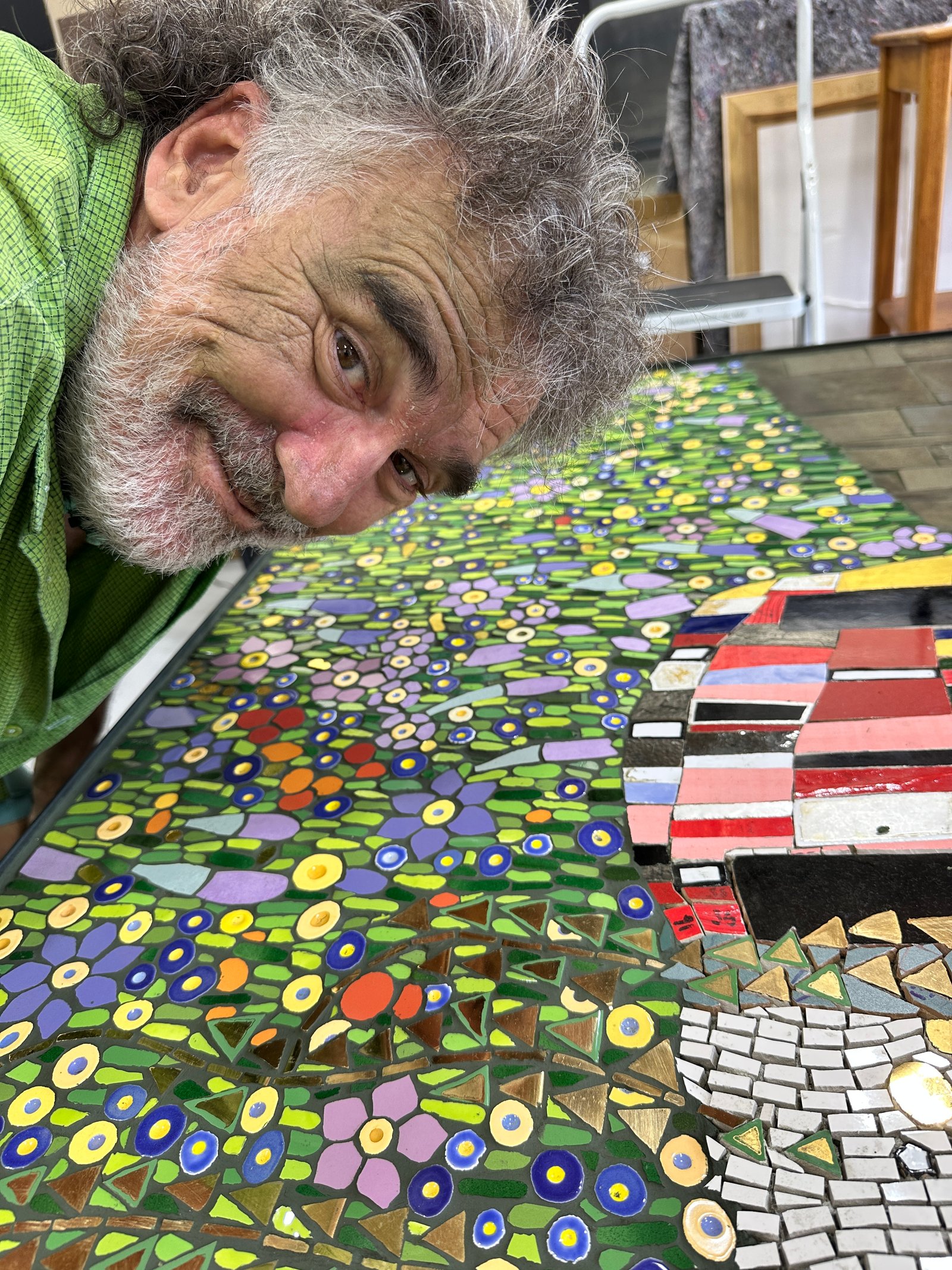 Brett beside the mosaic in progress